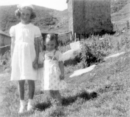 684: l-r Noreen Kerrivan &amp;amp; Elizabeth Lambe. At Margarees Cove, Red Island. (circa 1956) [courtesy of Jenny (Kerrivan) Harvie]  - Noreen daughter of Joseph Kerrivan &amp;amp; Madeline Bennett; Elizabeth daughter of Patrick Lambe &amp;amp; Mary Kerrivan